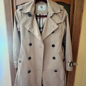 BURBERY woman's trench coat gently worn.  Beautiful style and color